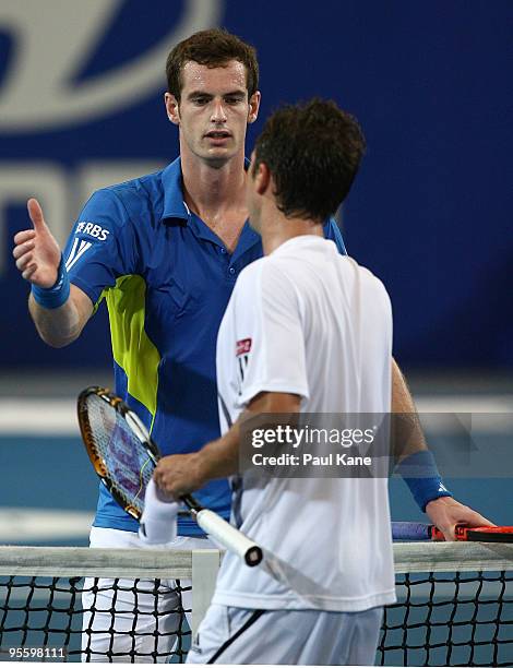 Andy Murray of Great Britain shakes hands Philipp Kohlschreiber of Germany after the Group B match between Great Britain and Germany during day five...