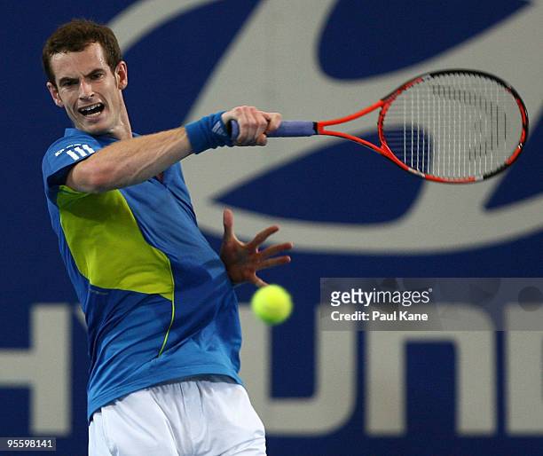Andy Murray of Great Britain plays a forehand shot in his match against Philipp Kohlschreiber of Germany in the Group B match between Great Britain...