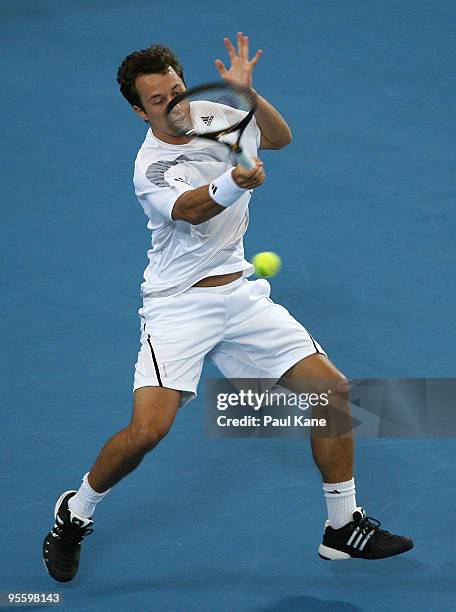 Philipp Kohlschreiber of Germany plays a forehand shot in his match against Andy Murray of Great Britain in the Group B match between Great Britain...