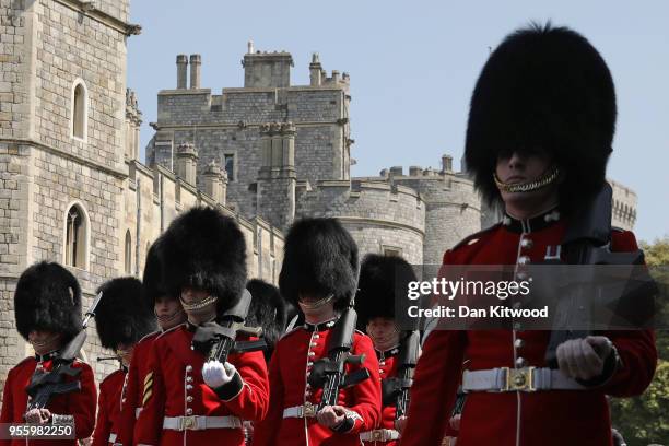 The changing of the guard ceremony takes place at Windsor Castle as it prepares for the wedding of Prince Harry and his fiance US actress Meghan...