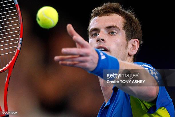 Andy Murray of Britain serves for the match against Philipp Kohlschreiber of Germany during their singles match on the seventh session, day five of...