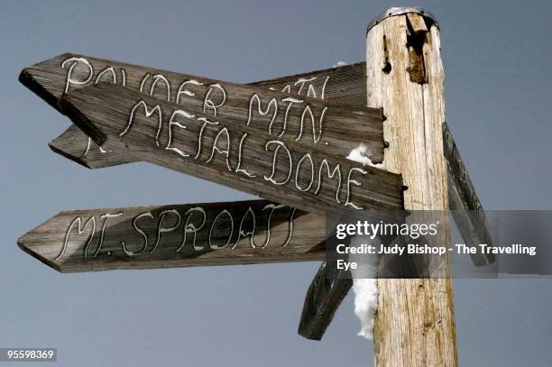 snowy sign on whistler peak - street name sign stock pictures, royalty-free photos & images