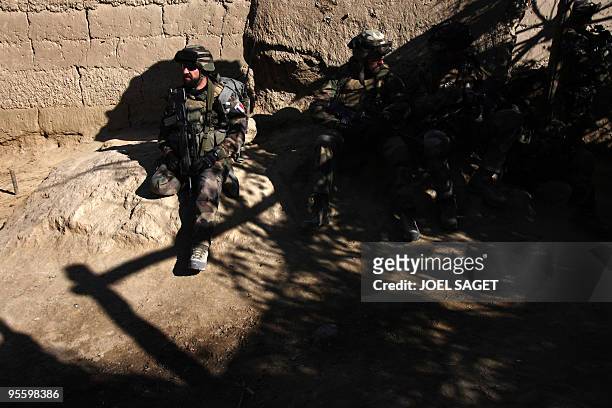 French soldiers of the 13 BCA take a break after a patrol at Jalokhel in Kapisa province on January 5, 2010. About 113,000 US and allied troops are...