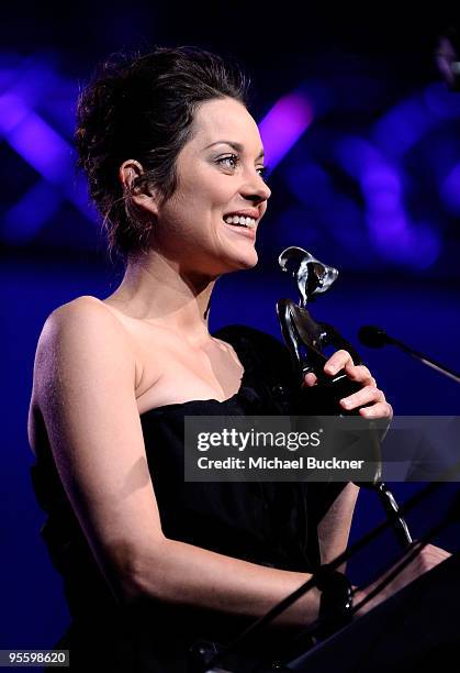 Actress Marion Cotillard accepts the Desert Palm Achievement award onstage at the 2010 Palm Springs International Film Festival gala held at the Palm...
