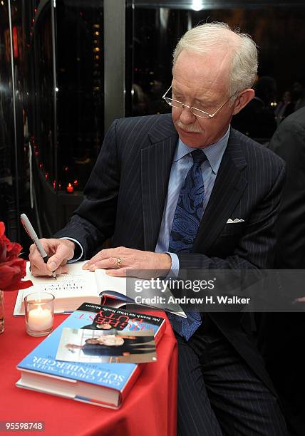 Captain Chesley B. "Sully" Sullenberger III signs autographs during the after party for the premiere of "Brace for Impact" at Stanley H. Kaplan...