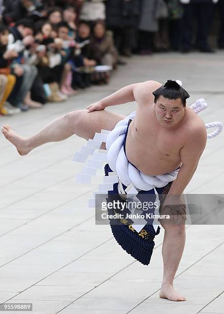 Sumo Grand Champion Hakuho performs 'Dohyo-iri' at the Meiji Jingu Shrine on January 6, 2010 in Tokyo, Japan. It is the custom that Sumo Grand...