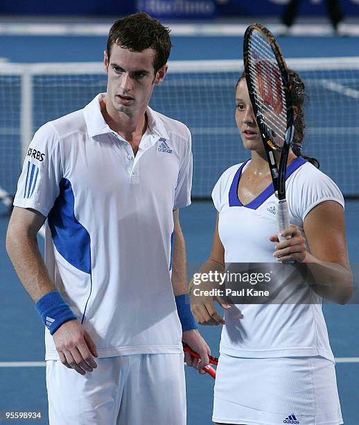 Andy Murray and Laura Robson of Great Britain look on during the mixed doubles match against Philipp Kohlschreiber and Sabine Lisicki of Germany in...