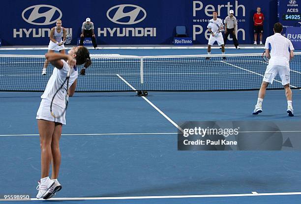 Laura Robson of Great Britain serves during the mixed doubles match against Philipp Kohlschreiber and Sabine Lisicki of Germany in the Group B match...