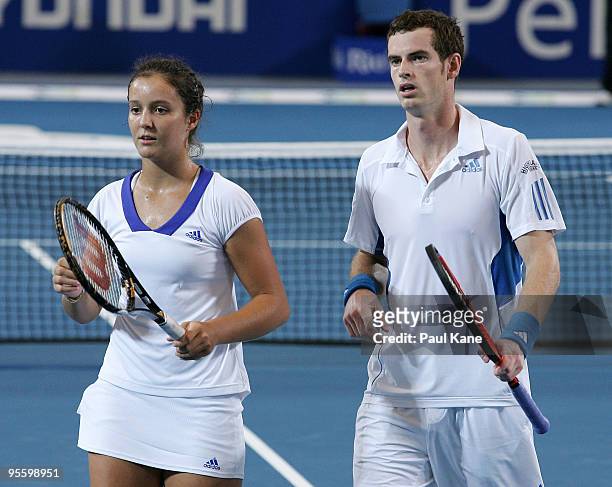 Laura Robson and Andy Murray of Great Britain look on during the mixed doubles match against Philipp Kohlschreiber and Sabine Lisicki of Germany in...