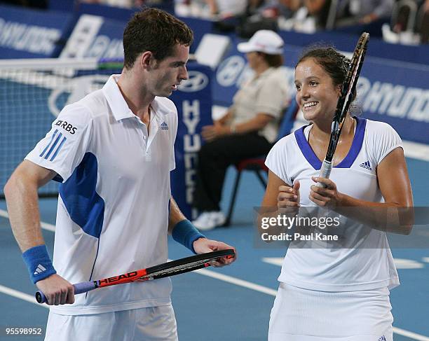 Andy Murray and Laura Robson of Great Britain talk tactics during the mixed doubles match against Philipp Kohlschreiber and Sabine Lisicki of Germany...