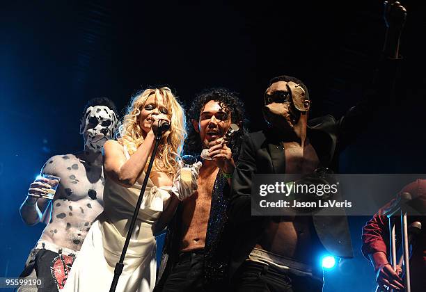 Drew Kuhse, Pamela Anderson and David LaChapelle on stage at the Gridlock 2010 New Year's Eve bash at Paramount Studios on December 31, 2009 in...