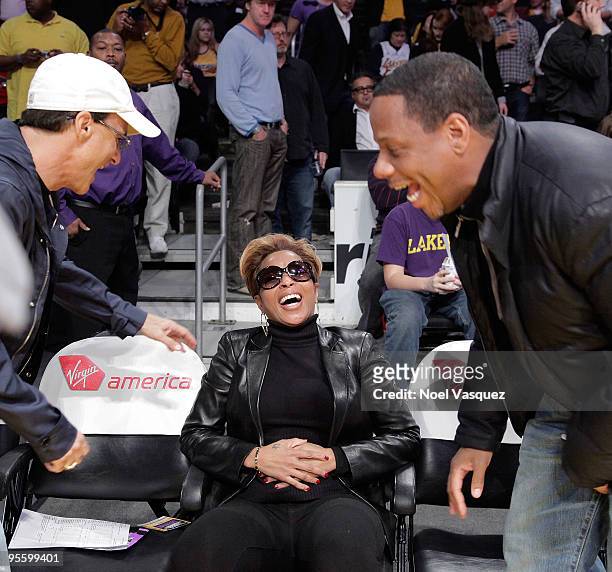Jimmy Iovine, Mary J. Blige and Martin Kendu Isaacs attend a game between the Houston Rockets and the Los Angeles Lakers at Staples Center on January...