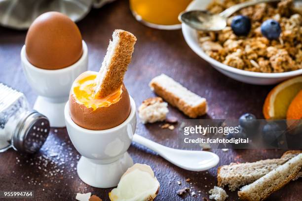 soft-boiled eggs for breakfast - soft boiled egg stock pictures, royalty-free photos & images