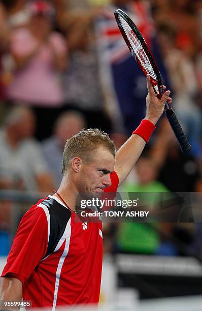 Lleyton Hewitt of Australia gestures during his match against John Isner of the US during their singles match on the fifth session, day four of the...