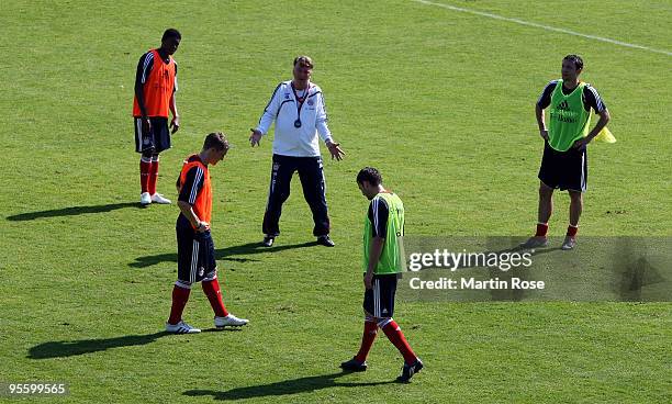 Louis van Gaal , head coach of Bayern Muenchen gives instructions during the FC Bayern Muenchen training session at the Al Nasr training ground on...