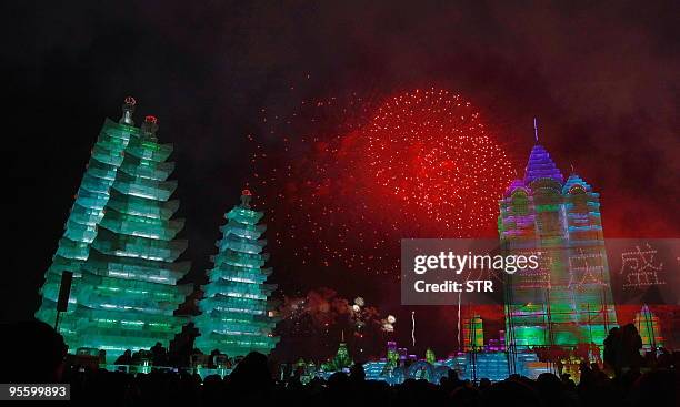 Fireworks light up the sky to kick off the annual Ice and Snow festival in Harbin, northeast China's Heilongjiang province on January 5, 2010. Fairy...