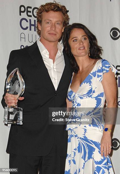 Actors Simon Baker and Robin Tunney poses in the press room at the 35th Annual People's Choice Awards held at the Shrine Auditorium on January 7,...