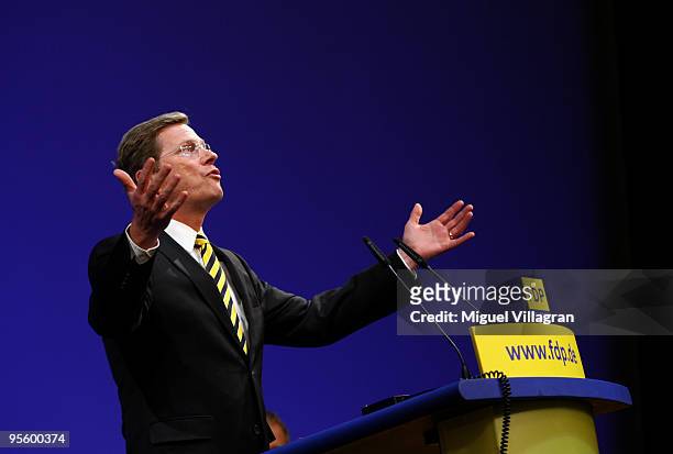 German Foreign Minister and German Free Democrats Chairman Guido Westerwelle addresses the audience during the FDP Ephiphany conference on January 6,...