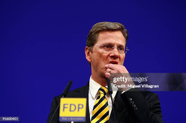 German Foreign Minister and German Free Democrats Chairman Guido Westerwelle addresses the audience during the FDP Ephiphany conference on January 6,...