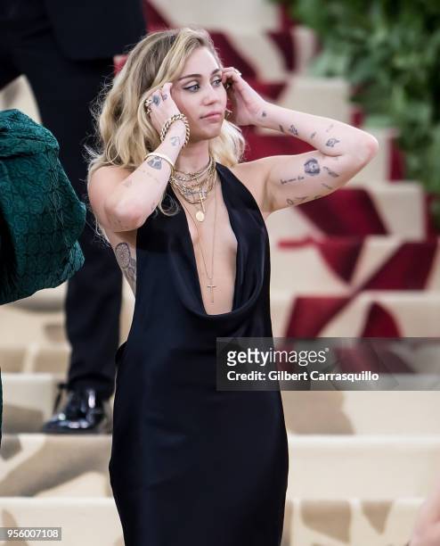 Miley Cyrus is seen arriving to the Heavenly Bodies: Fashion & The Catholic Imagination Costume Institute Gala on May 7, 2018 in New York City.
