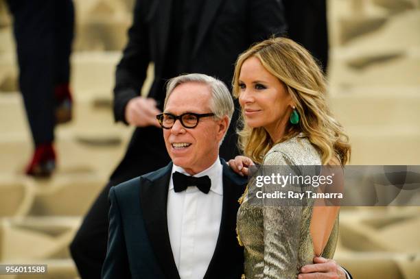 Fashion designer Tommy Hilfiger and Dee Ocleppo enter the Heavenly Bodies: Fashion & The Catholic Imagination Costume Institute Gala at The...