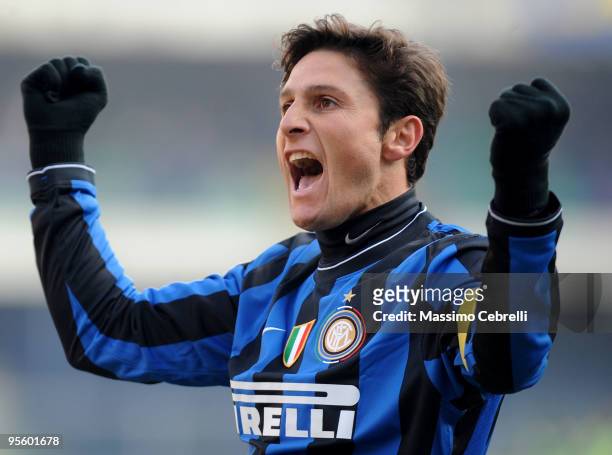 Javier zanetti of FC Inter Milan celebrates the victory cheering his fans after the Serie A match between AC Chievo Verona and FC Inter Milan at...