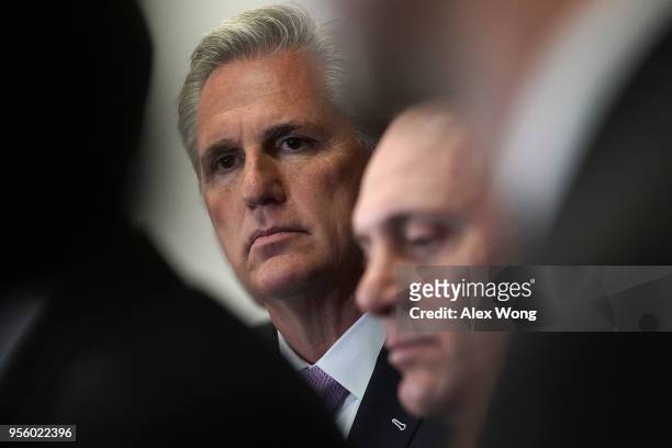 House Majority Leader Rep. Kevin McCarthy and House Majority Whip Rep. Steve Scalise listen during a news conference May 8, 2018 at the U.S. Capitol...