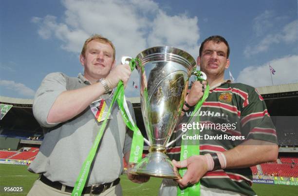 Leicester Coach Dean Richards and Captain Martin Johnson celebrate after the Heineken Cup Final between Stade Francais and Leicester played at the...