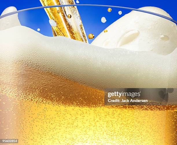 beer foam wave - beer close up stock pictures, royalty-free photos & images