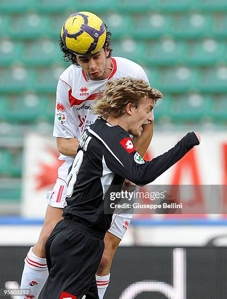 Andrea Ranocchia of AS Bari and Dusan Basta of Udinese Calcio in action during the Serie A match between AS Bari and Udinese Calcio at Stadio San...