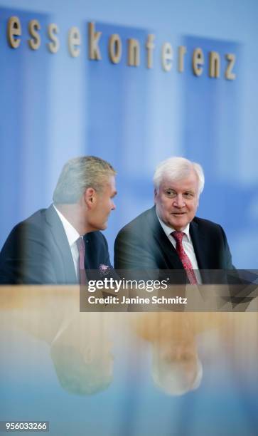German Interior Minister Horst Seehofer and Interior Minister of the federal state Saxony-Anhalt Holger Stahlknecht are pictured during the...