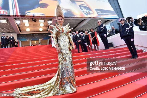 Russian businesswoman and tv presenter Elena Lenina poses as she arrives on May 8, 2018 for the screening of the film "Todos Lo Saben " and the...