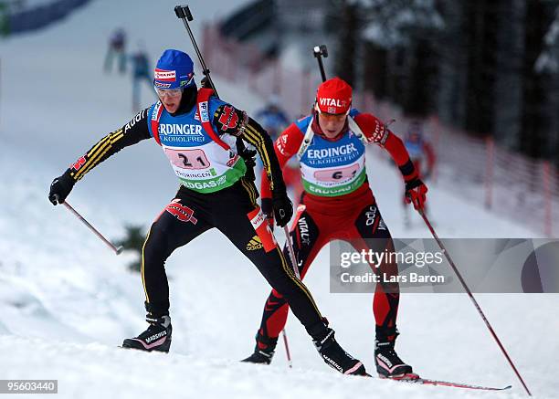 Martina Beck of Germany competes infront of Ann Kristin Flatland of Norway during the Women's 4 x 6km Relay in the e.on Ruhrgas IBU Biathlon World...