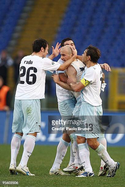 Tommaso Rocchi is congratulated by Sebastiano Siviglia and Stefan Radu , Alexander Kolarov of SS Lazio celebrate the third goal during the Serie A...