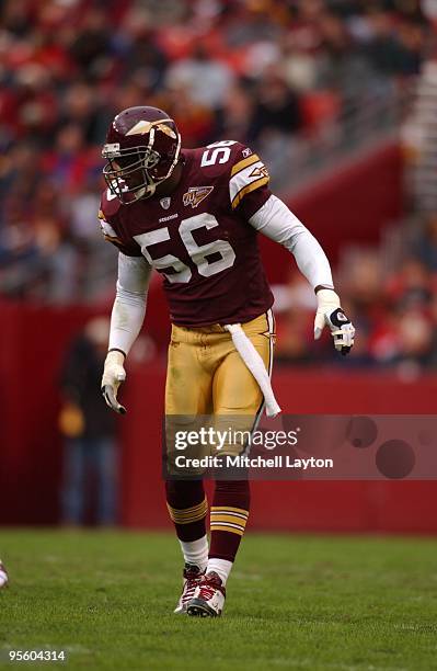 Lavar Arrington of the Washington Redskins looks on during a NFL football game against the Houston Texans on December 22, 2002 at FedEx Field in...