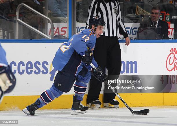 Todd White of the Atlanta Thrashers carries the puck against the Montreal Canadiens at Philips Arena on December 21, 2009 in Atlanta, Georgia.