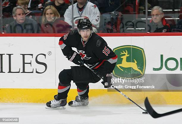 Tuomo Ruutu of the Carolina Hurricanes controls the puck on the ice during a NHL game against the New York Rangers on December 31, 2009 at RBC Center...