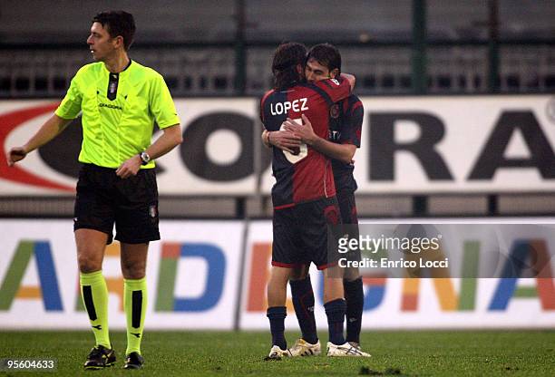 Daniele Conti and Diego Lopez of Cagliari celebrate during the Serie A match between Cagliari and Roma at Stadio Sant'Elia on January 6, 2010 in...