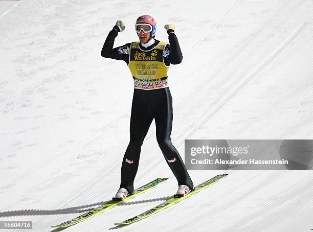 Andreas Kofler of Austria celebrates after final round for the FIS Ski Jumping World Cup event of the 58th Four Hills ski jumping tournament on...