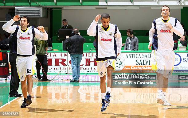 Damir Kaan Mrsic, #12 and Lynn Greer, #14 of Fenerbahce Ulker warm up before the tip off during the Euroleague Basketball Regular Season 2009-2010...