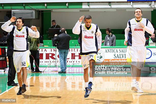 Damir Kaan Mrsic, #12 and Lynn Greer, #14 of Fenerbahce Ulker warm up before the tip off during the Euroleague Basketball Regular Season 2009-2010...