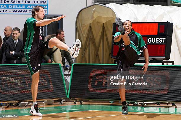 Denis Marconato, #18 and David Hawkins, #17 of Montepaschi Siena warm up before the tip off during the Euroleague Basketball Regular Season 2009-2010...