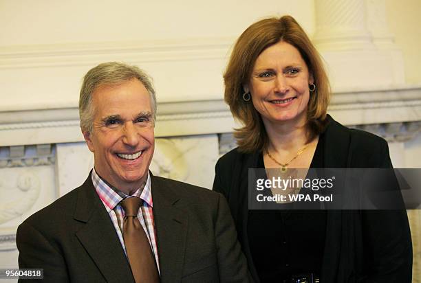 The Prime Minister's wife Sarah Brown and actor Henry Winkler pose at the launch of The First News My Way!, at 10 Downing Street on January 6 in...