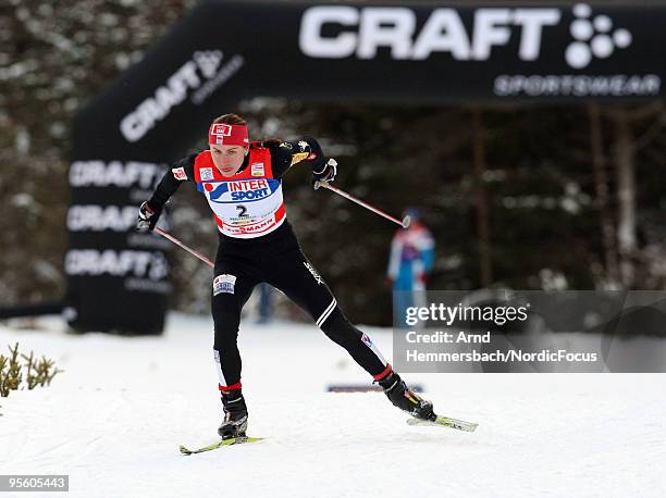 Justyna Kowalczyk of Poland competes during the 15km women handicap start for the FIS Cross Country World Cup Tour de Ski on January 06, 2010 in...