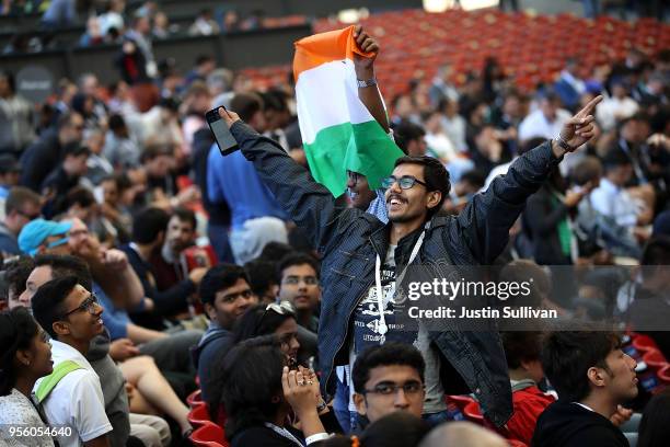 Attendees cheer before the start of the Google I/O 2018 Conference at Shoreline Amphitheater on May 8, 2018 in Mountain View, California. Google's...