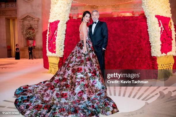 Amal Clooney and George Clooney attend the Heavenly Bodies: Fashion & The Catholic Imagination Costume Institute Gala at The Metropolitan Museum of...