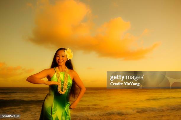 hawaiian hula dancer on the beach of kauai at sunset - polynesia stock pictures, royalty-free photos & images