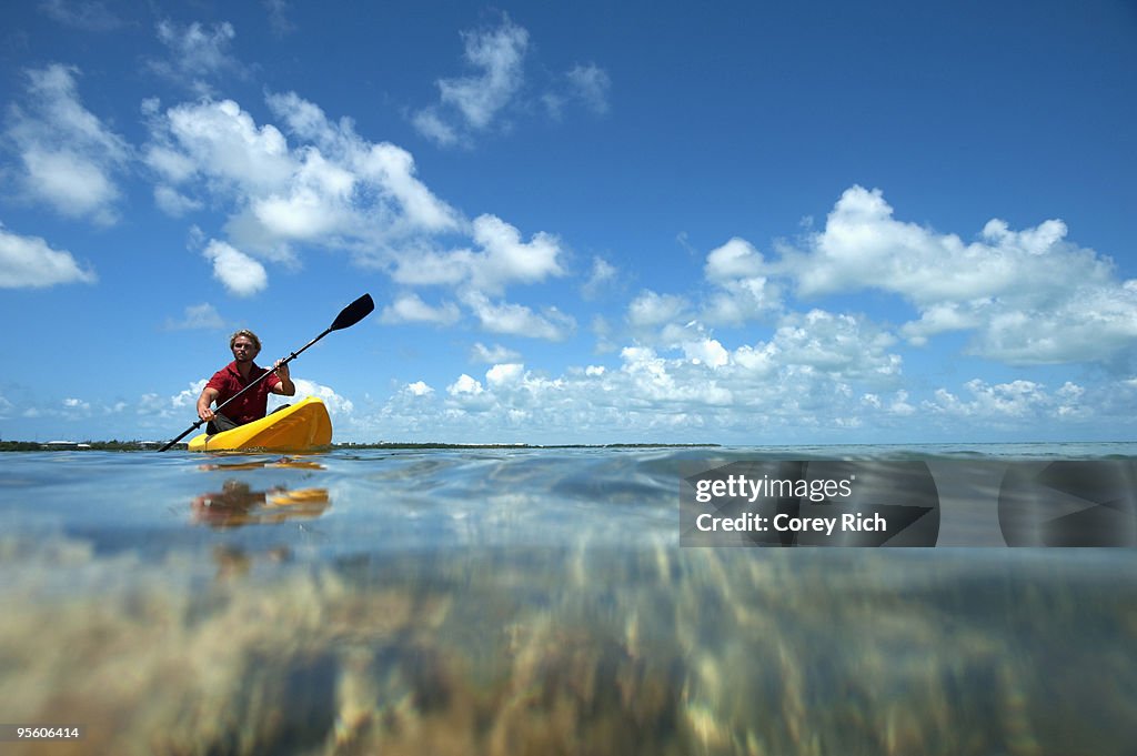 A man kayaks in Florida.