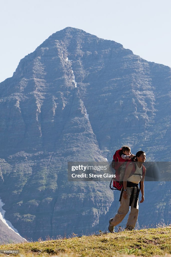 A mother carries her 14 month old son in her backpack over Frigid Air Pass during a multiday backpac