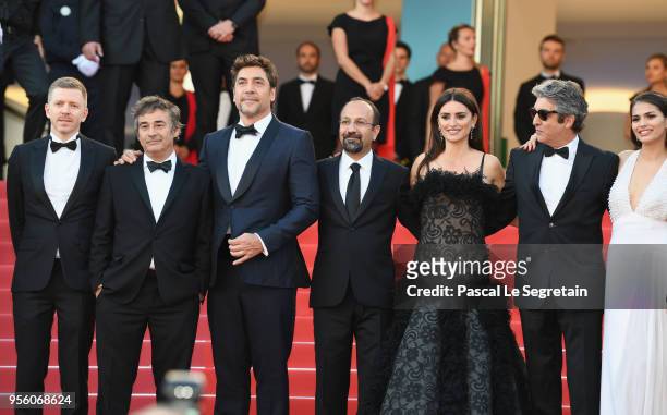 Producer Alexandre Mallet-Guy, actor Eduard Fernandez, Javier Bardem, director Asghar Farhadi and actress Penelope Cruz, wearing jewels by Atelier...